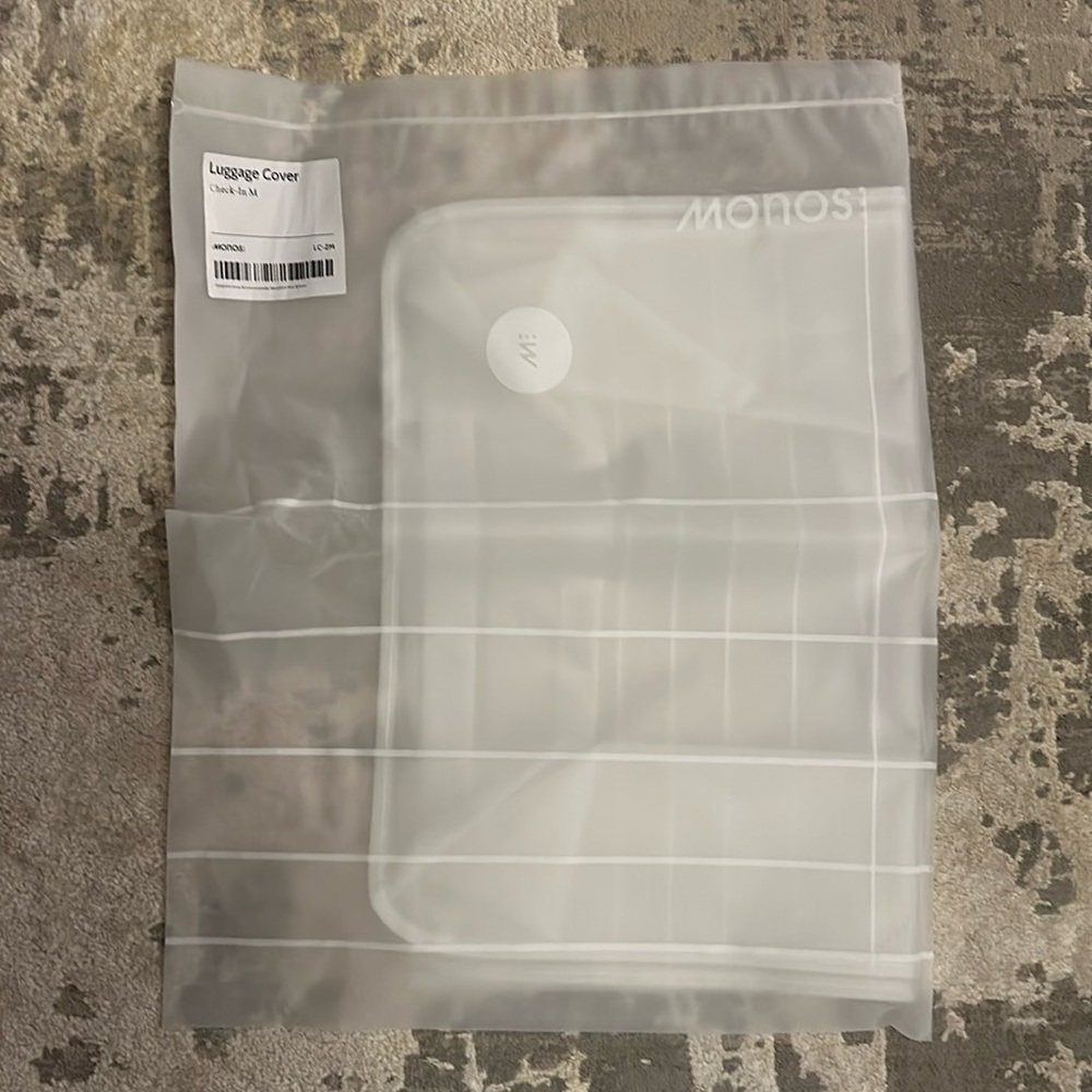 Brand New Monos Luggage Check In M cover